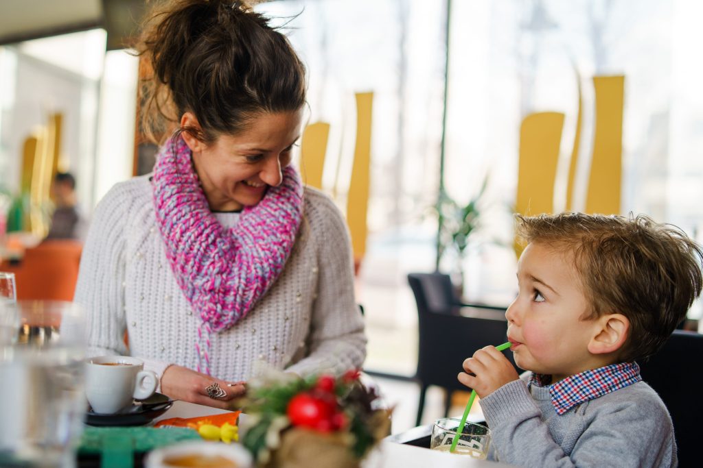 cute-boy-sitting-with-mother